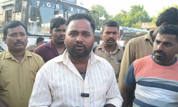 Private RTC bus drivers protest near the Wanaparthy depot over overcrowding, mileage targets and alleged pressure from officials.