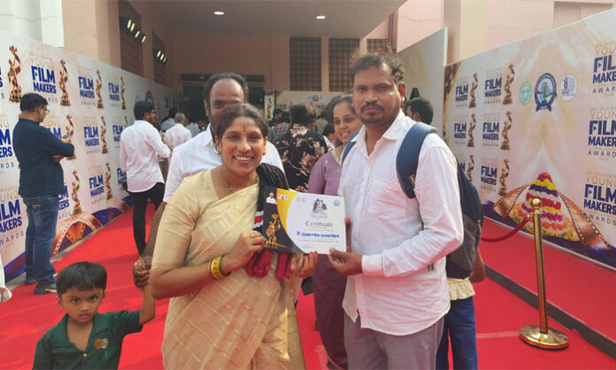 Ragam Sambasiva Rao receives a Participation Award for his short film Hydra Bathukamma at Shilpakala Vedika in Hyderabad.